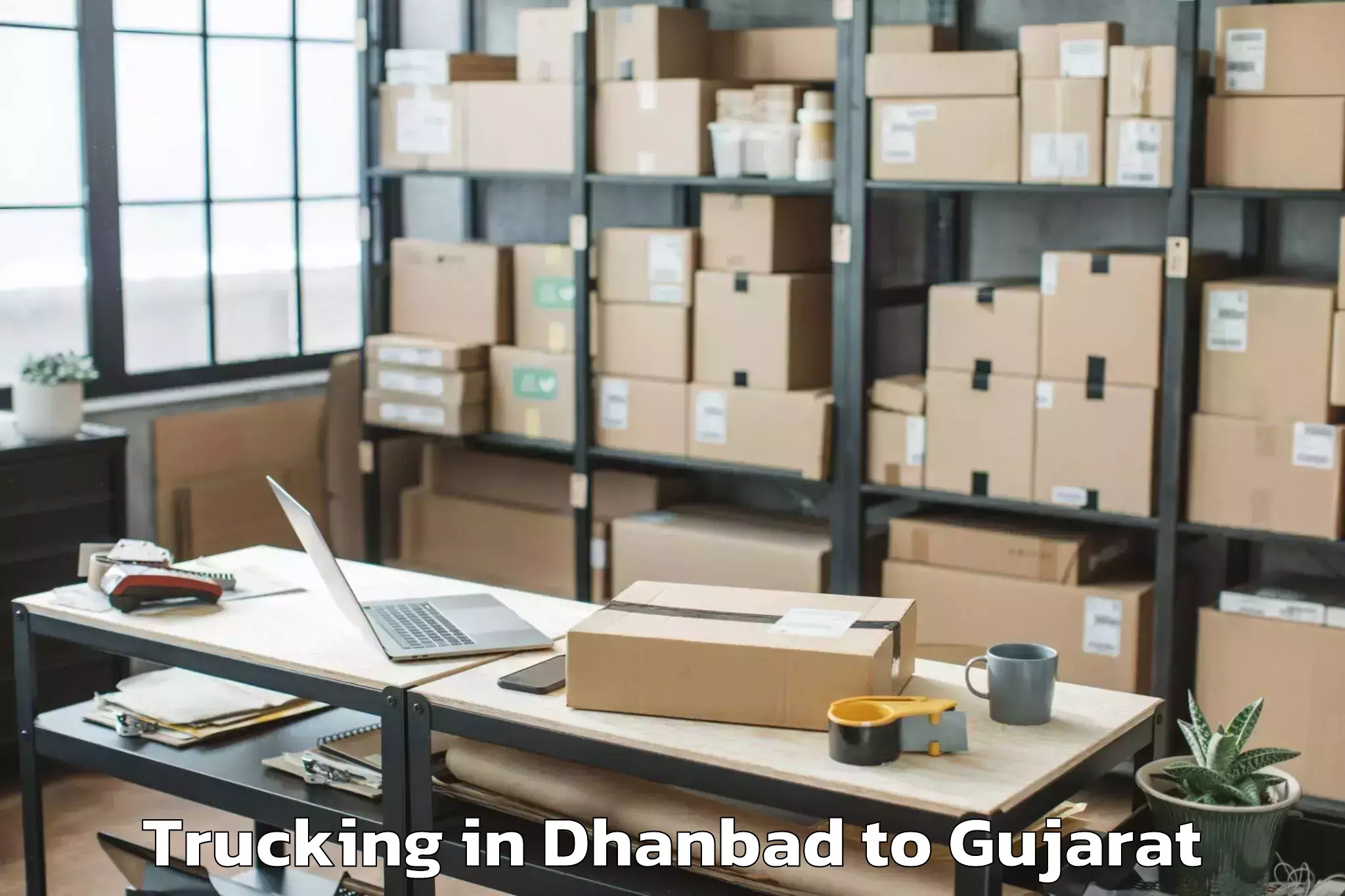 Expert Dhanbad to Khambhalia Trucking